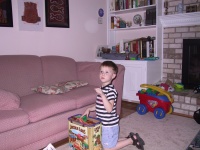 Campbell_putting_his_toys_away.jpg
